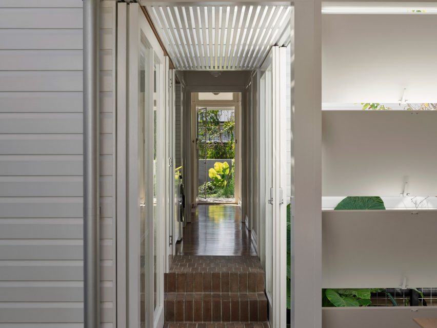 Brick corridor in Hopscotch House by John Ellway Architect