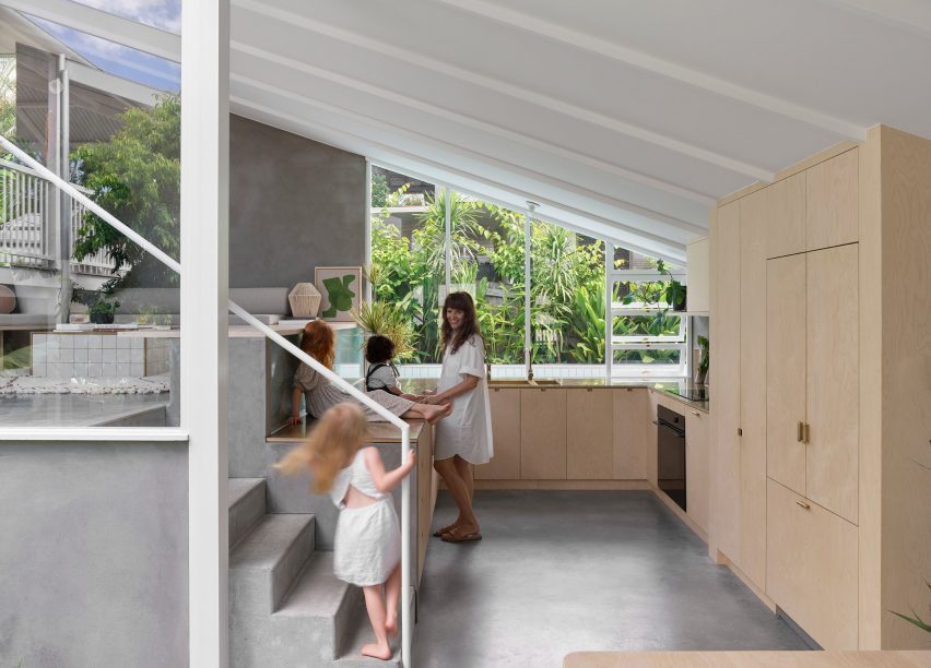 Split-level kitchen with concrete floors