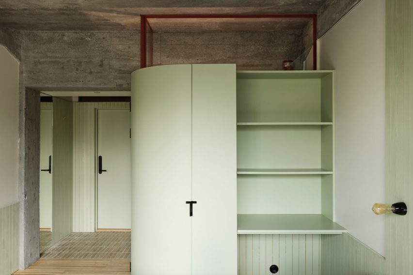 Bedroom interior of the Trevarefabrikken hotel by Jonathan Tuckey Design