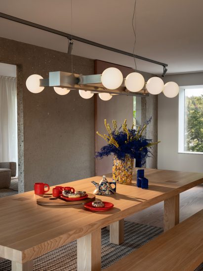 Metal chandelier above dining table