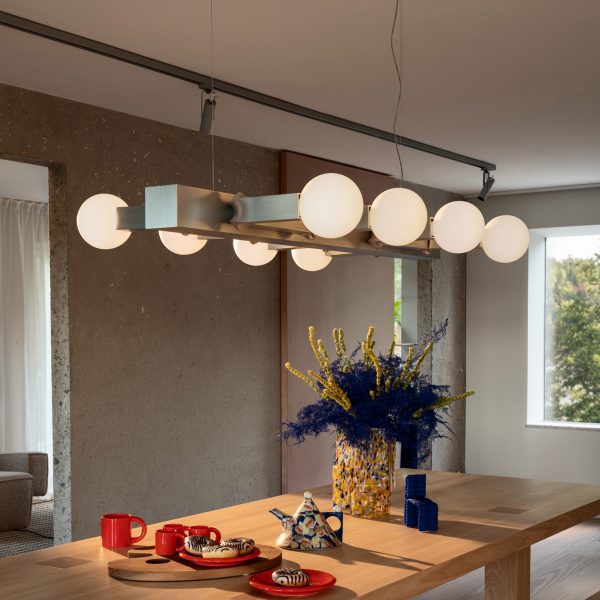 Metal chandelier above dining table