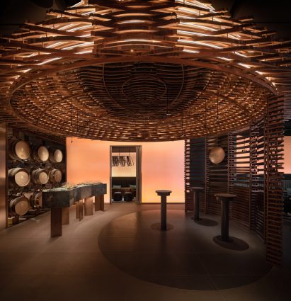 Interior of Lai Zhou Bar by RooMoo features offcuts from wooden whiskey barrels