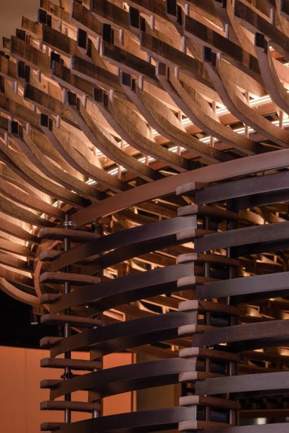 Interior of Lai Zhou Bar by RooMoo features offcuts from wooden whiskey barrels