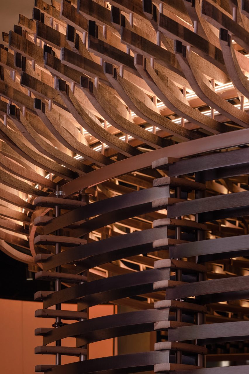 Interior of Lai Zhou Bar by RooMoo features offcuts from wooden whiskey barrels