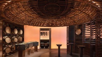Interior of Lai Zhou Bar by RooMoo features offcuts from wooden whiskey barrels