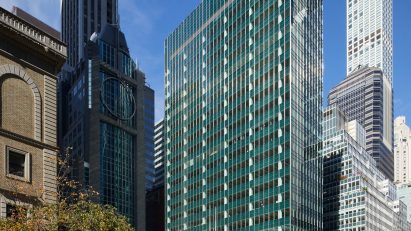 A building with a green glass facade
