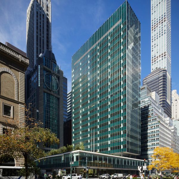 A building with a green glass facade