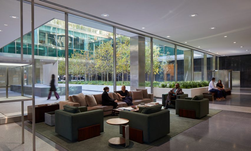 A lobby building with velvet furniture