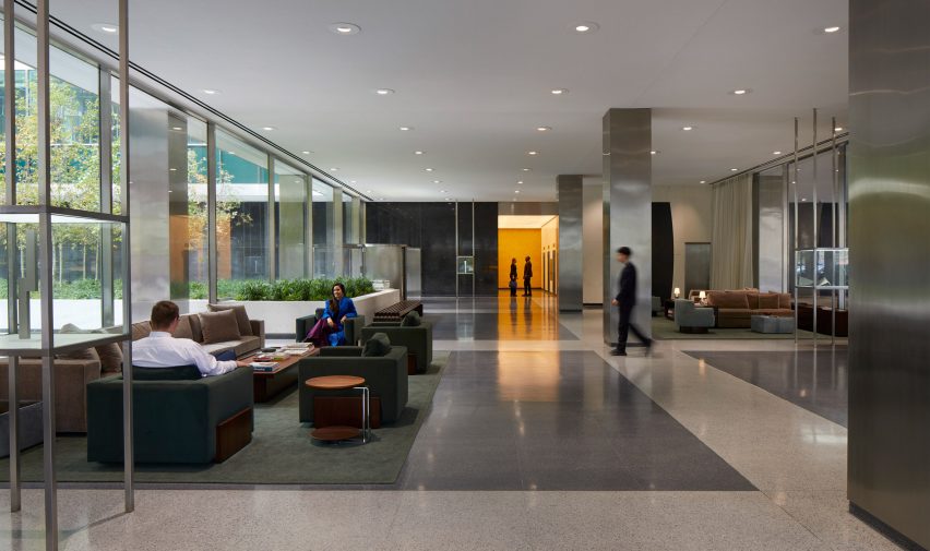 A lobby building with velvet furniture