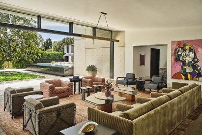 Large living room with various earth-toned soft seating options