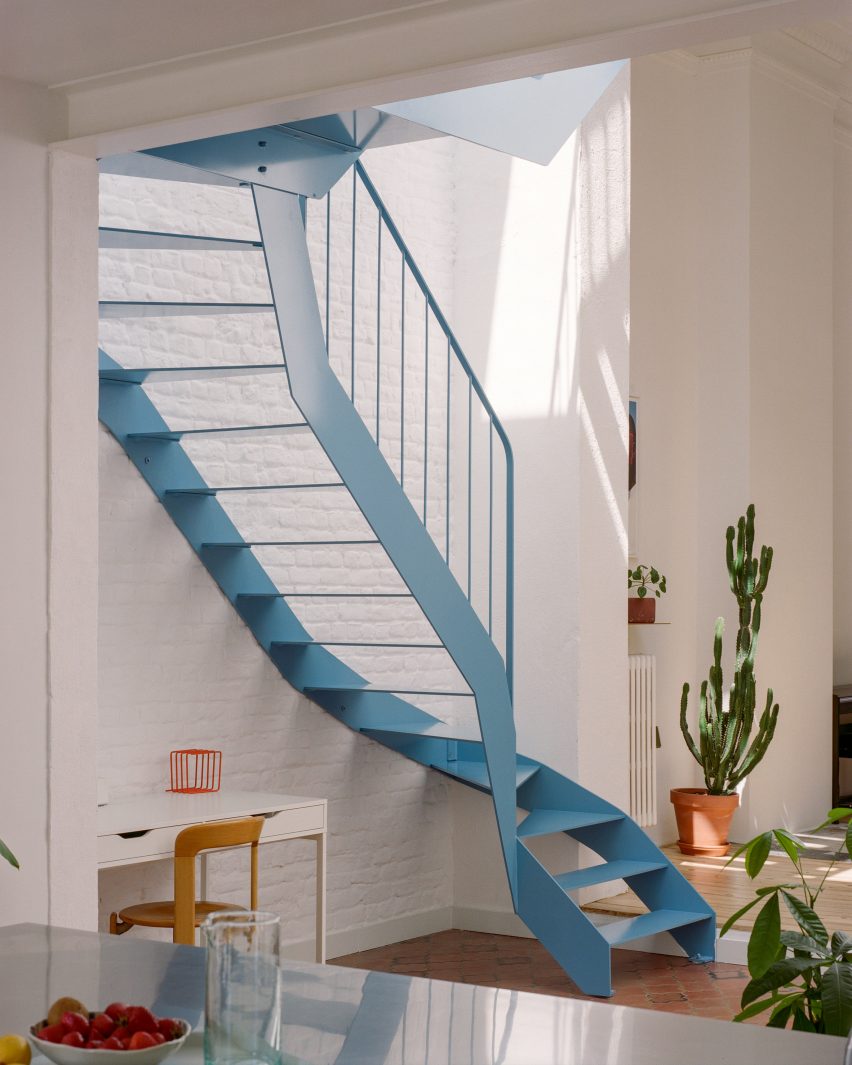 Blue metal staircase in an atrium