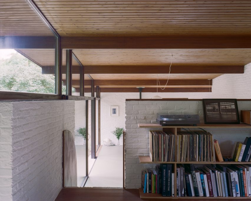 Interior with white brick walls, timber ceilings and clerestory windows
