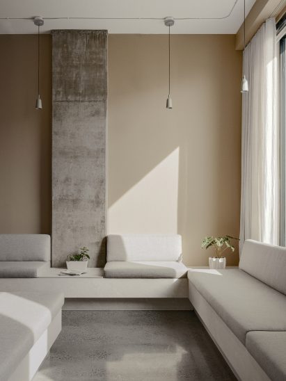 Built-in seating wraps around the perimeter of the reception area