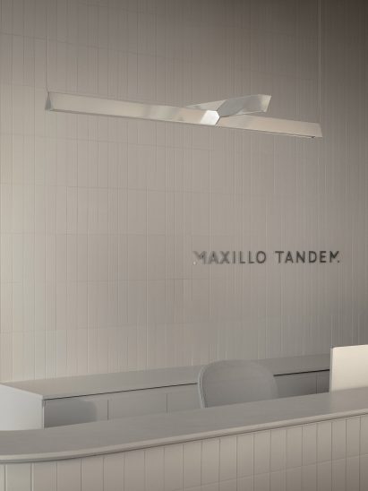 Off-white tiles behind the reception counter