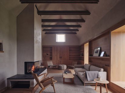 Double height interior living space of a highland guesthouse