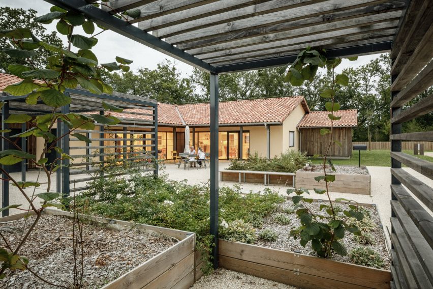 Outdoor garden at the Alzheimer's Village in France by NOMO Architects