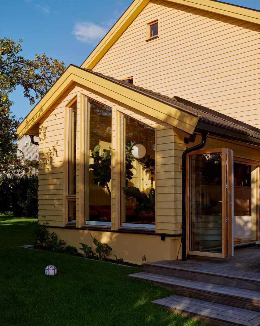 Yellow House in the Apple Garden by Familien Kvistad