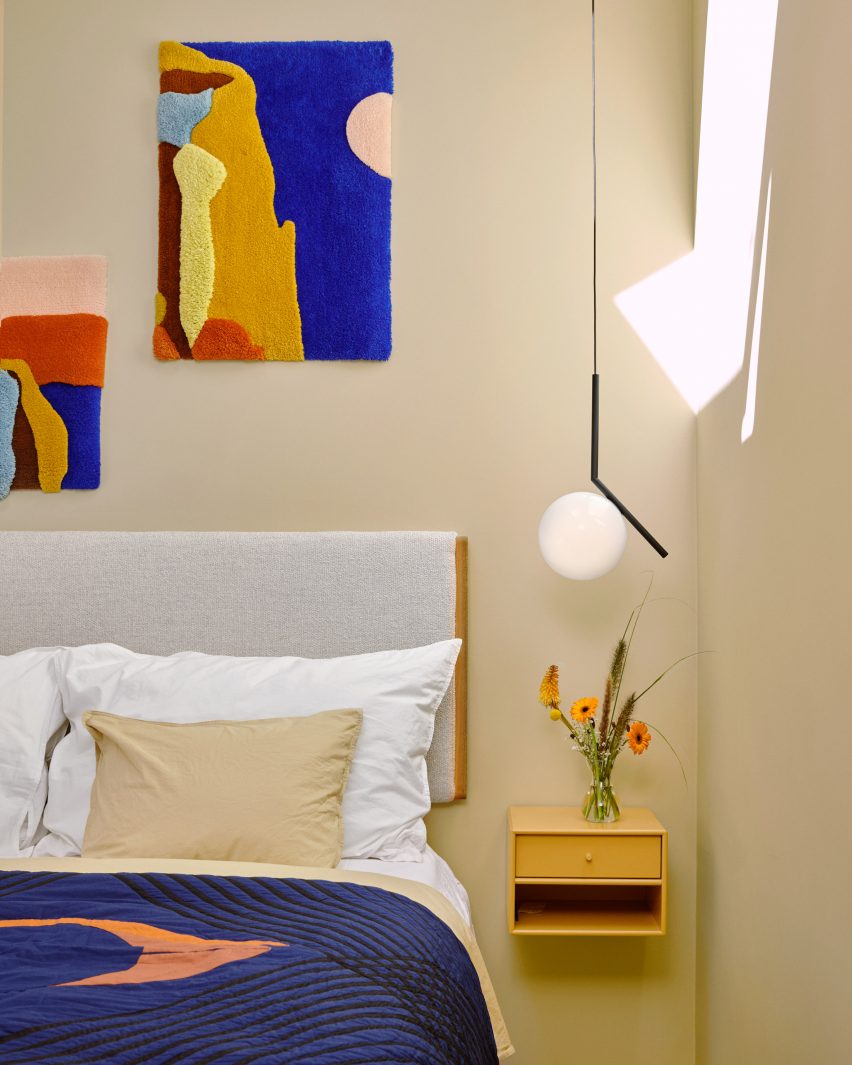 Bedroom with wall carpets by Familien Kvistad