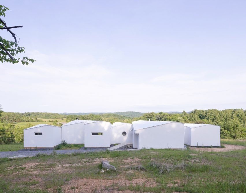 A long horizontal home made of various volumes