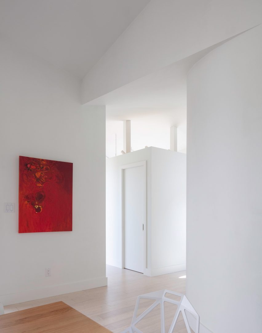 A red painting on a white walls