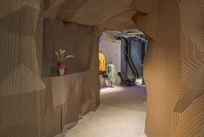 Cardboard cave in car showroom