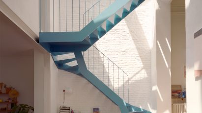 Blue metal staircase in an atrium