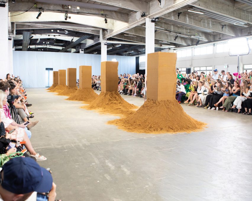 Sand installation by Spacon & X at Stine Goya Spring/Summer 2023 show Whisper Loud
