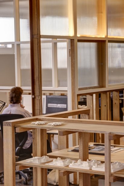 Interior view of workspace and timber shelving in TERRIOR's Hobart office