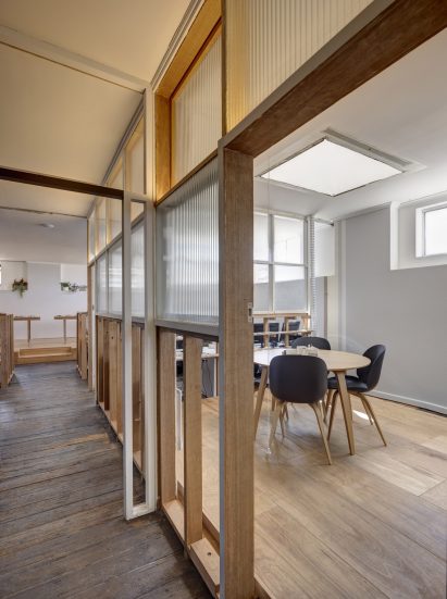 Interior view of corridor and workspace in TERRIOR's Hobart office