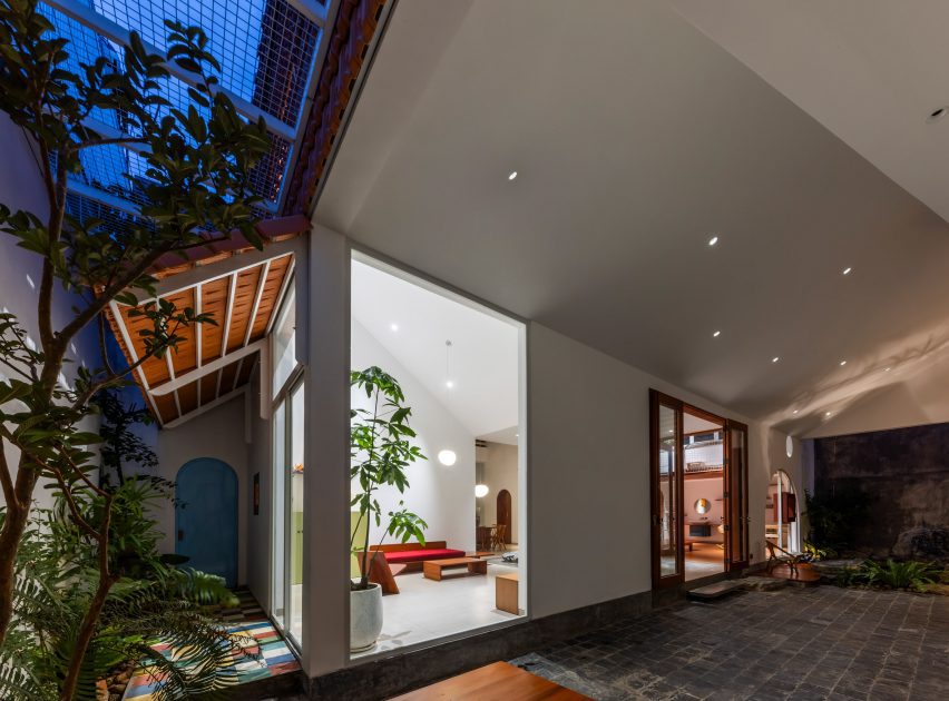 Courtyard space leading into the Tile House by The Bloom Architects