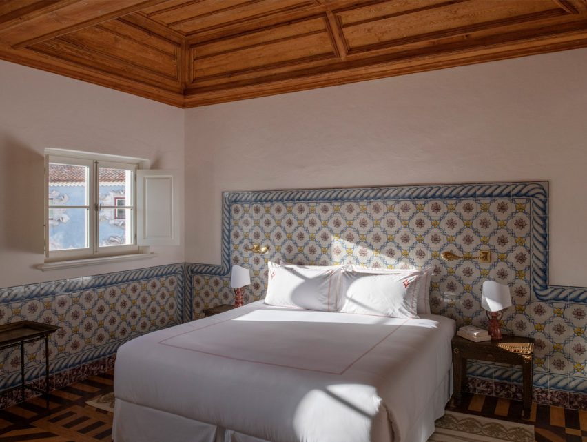 Bedroom with tiled headboard