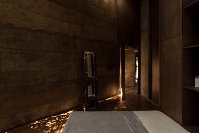 View of bedroom within Nisarga Art Hub by Wallmakers in Kerala, India
