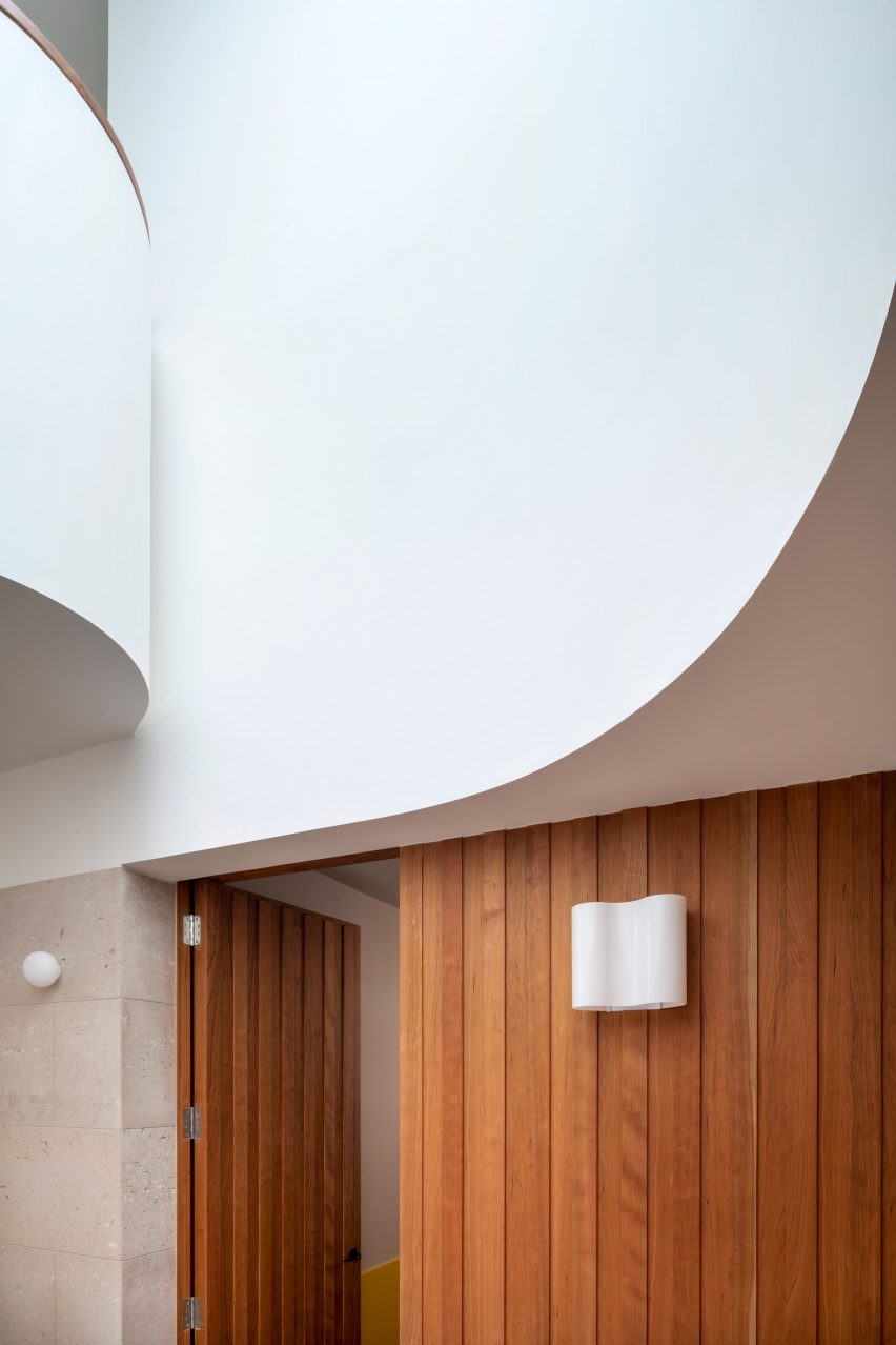 Curved wall in hallway of house renovation by Gundry & Ducker