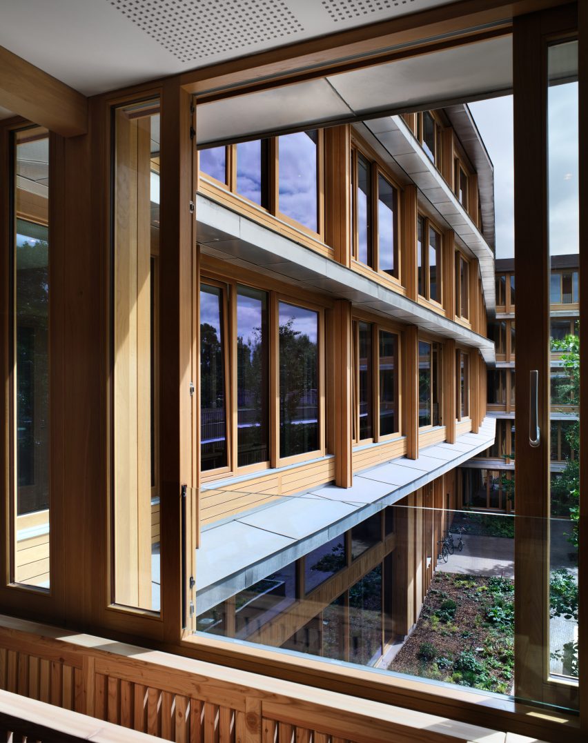 Timber-framed window overlooking the Appleby Blue housing by Witherford Watson Mann
