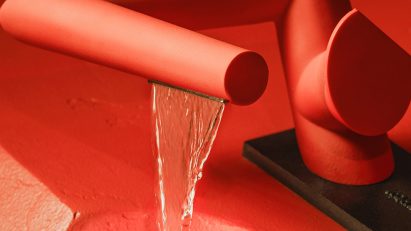 Orange Kohler tap