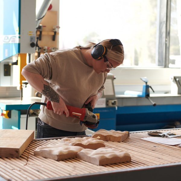 Designer working on wood-based project