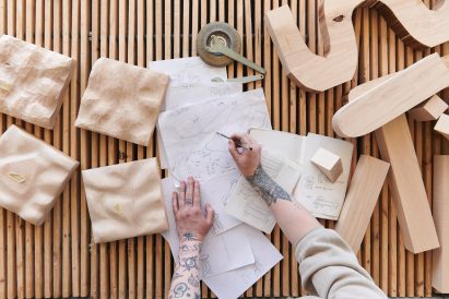Designer working with American maple hardwood