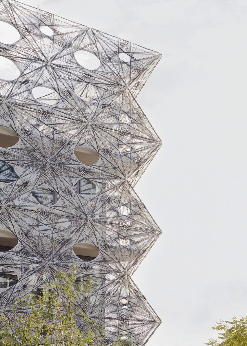 Woven facade at Texoversum school of textiles by Allmannwappner and Menges Scheffler Architekten