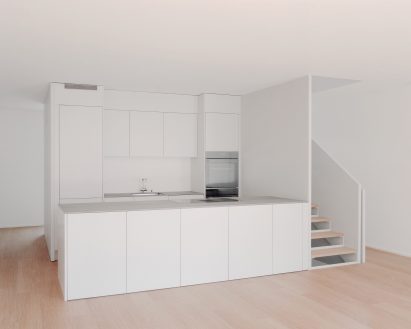 Kitchen interior of the concrete terrace houses in Switzerland by Atelier Rampazzi