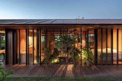 Glazed facade of Spanish pool house by Baldo Arquitectura