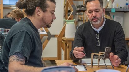 Misha Villanueva working with industrial design professor at Cleveland Institute of art Dan Cuffaro