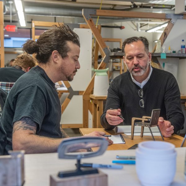 Misha Villanueva working with industrial design professor at Cleveland Institute of art Dan Cuffaro