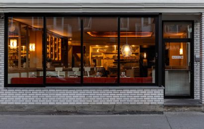 View of Montreal restaurant with white brick