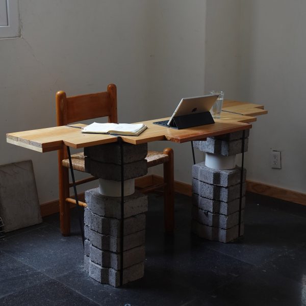 Table with reclaimed paving stone legs