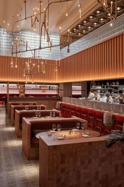 Main restaurant with bespoke timber seating by Joyn Studio