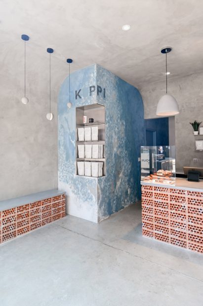 Cafe with concrete walls, ceiling and floor