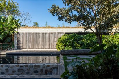 Tree-lined gardens feature throughout the property