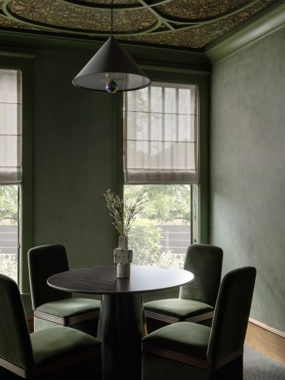 Green interior with wall paper o ceiling
