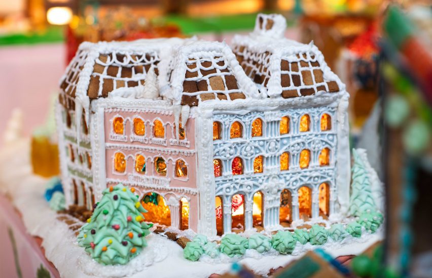 a gingerbread facade covered in icing and piping