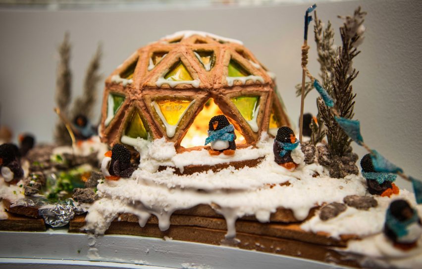 a geometric building made with gingerbread with candy windows